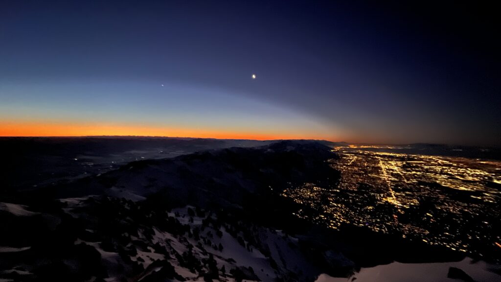 "Sunrise over Ogden" by Nicolette Jessen. 2022 Vocies from the Ward cover photograph